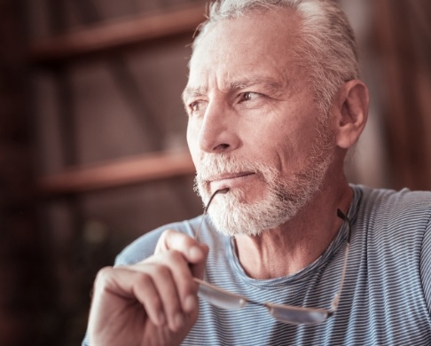 Man in pain before emergency dentistry visit