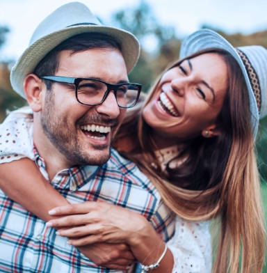 Couple with flawless smile after cosmetic dentistry